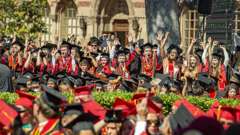 USC graduates celebrate during a commencement ceremony at University Park Campus.
