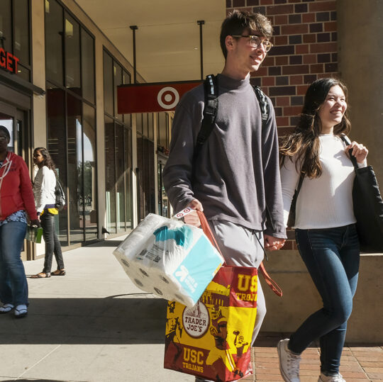 Students shopping at USC Village retailers.