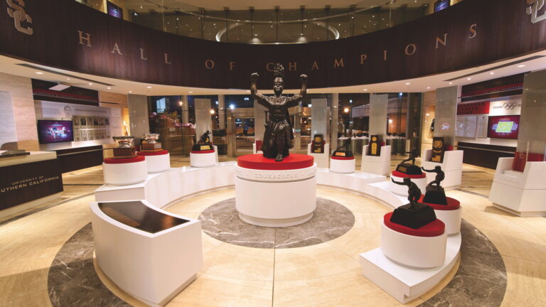 Heisman trophies lined up in Heritage Hall