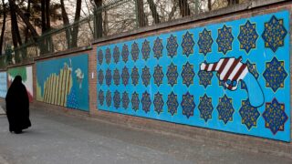 Person outside dormer U.S. embassy in Tehran, Iran