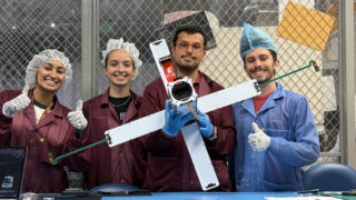 Team members and satellite